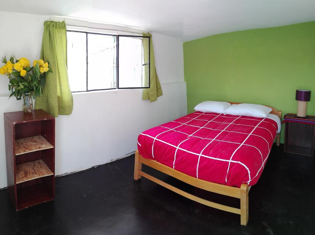 The Grasshopper Hostel Cusco Rum bild